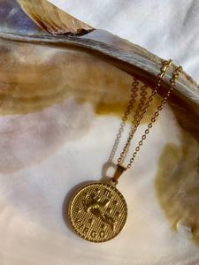 Collier médaille astro Stella