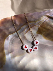 Collier perle(s) coeur